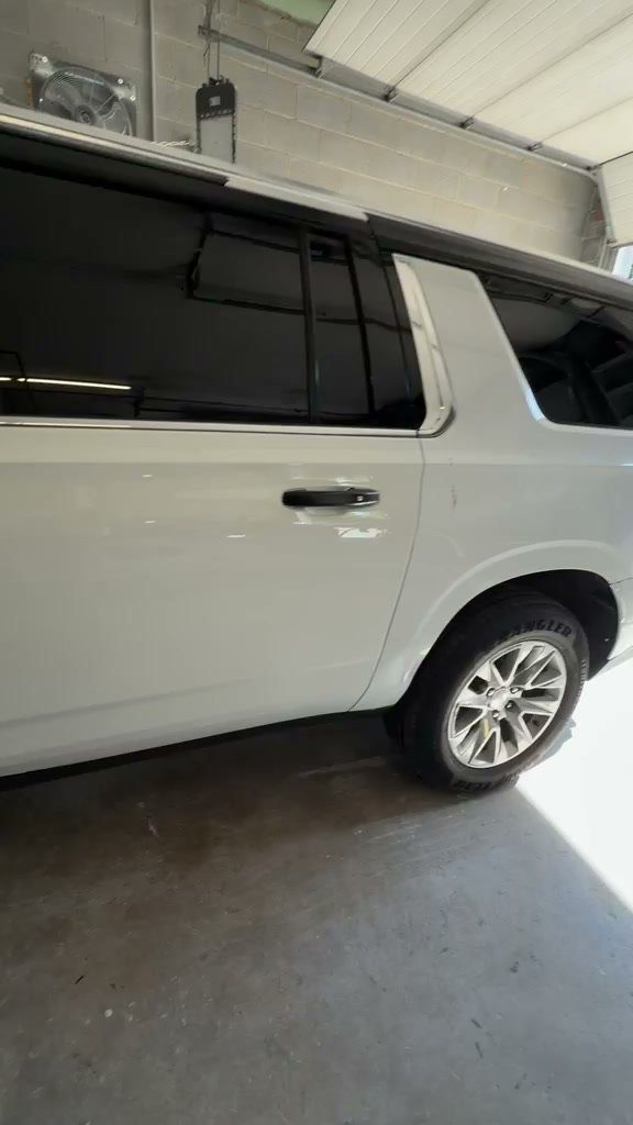 White SUV paint inspection video poster